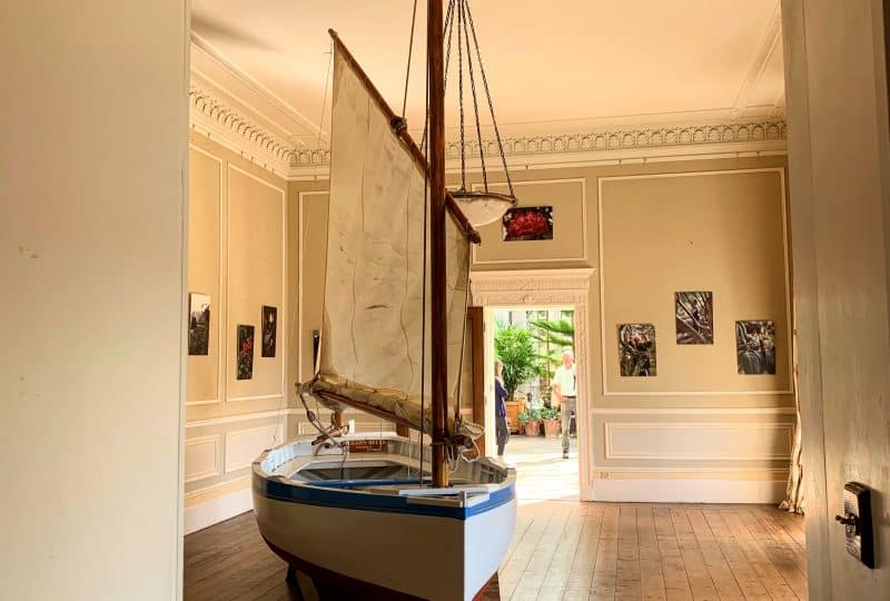 Photo of the 'Daisy Belle' on display in a room at Trelissick.
