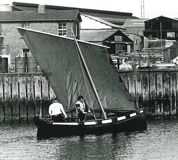 A black and white photo of two men sailing in the 'Ethel'.