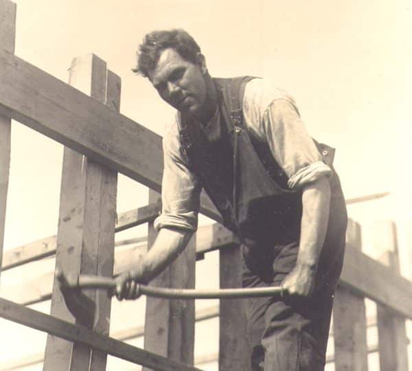A black and white photo of Percy Mitchell at work.