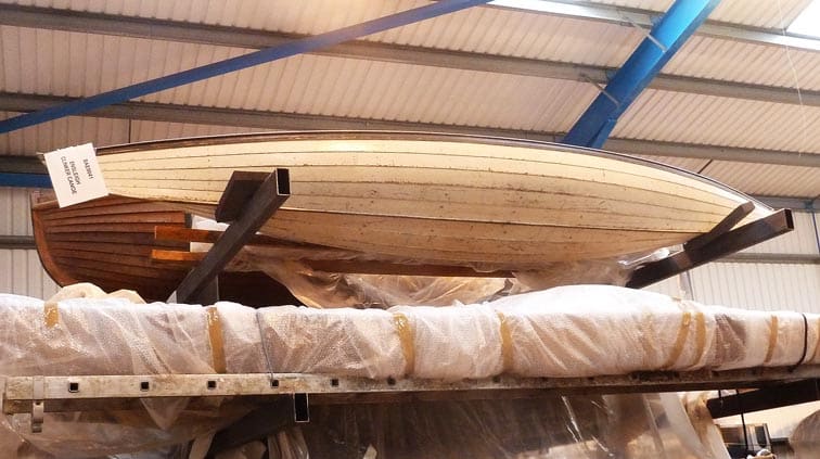 Photo of the Museum's Endsleigh Canoe in storage.