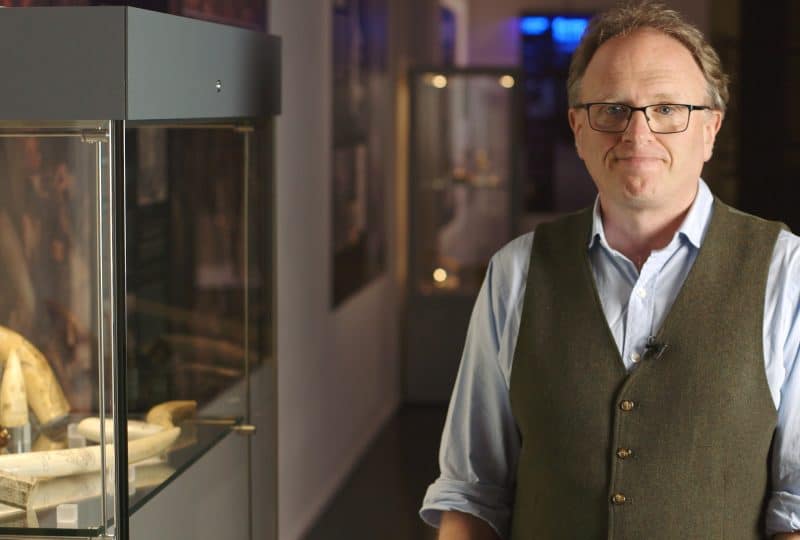 Co-curator Stuart Slade stands in the Museum's 'Captain Bligh: Myth, Man and Mutiny' exhibition.