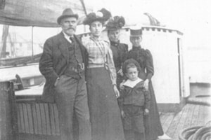 Black and white photo of Selina Smith and her family on board the 'Gem'.