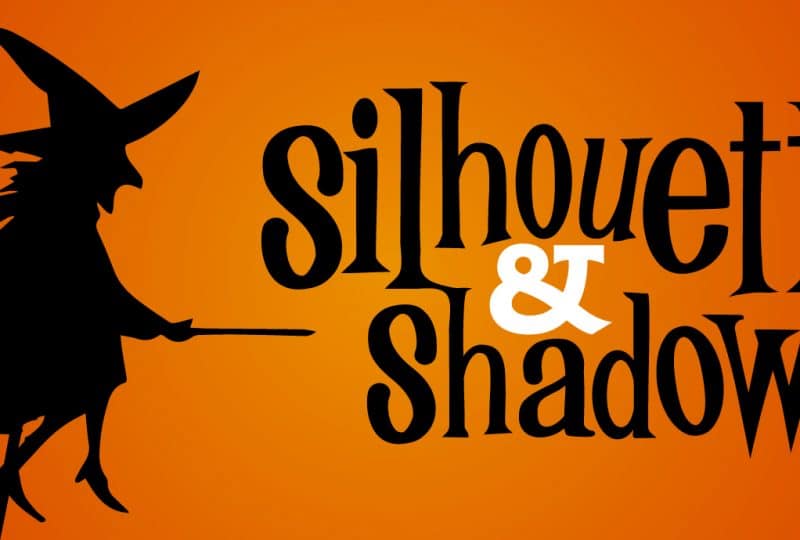 Against an orange background, text reads 'Silhouettes & Shadows - October Half Term'. Surrounding it are several shadow puppets shaped like bats, a pumpkin and a witch riding a broom.