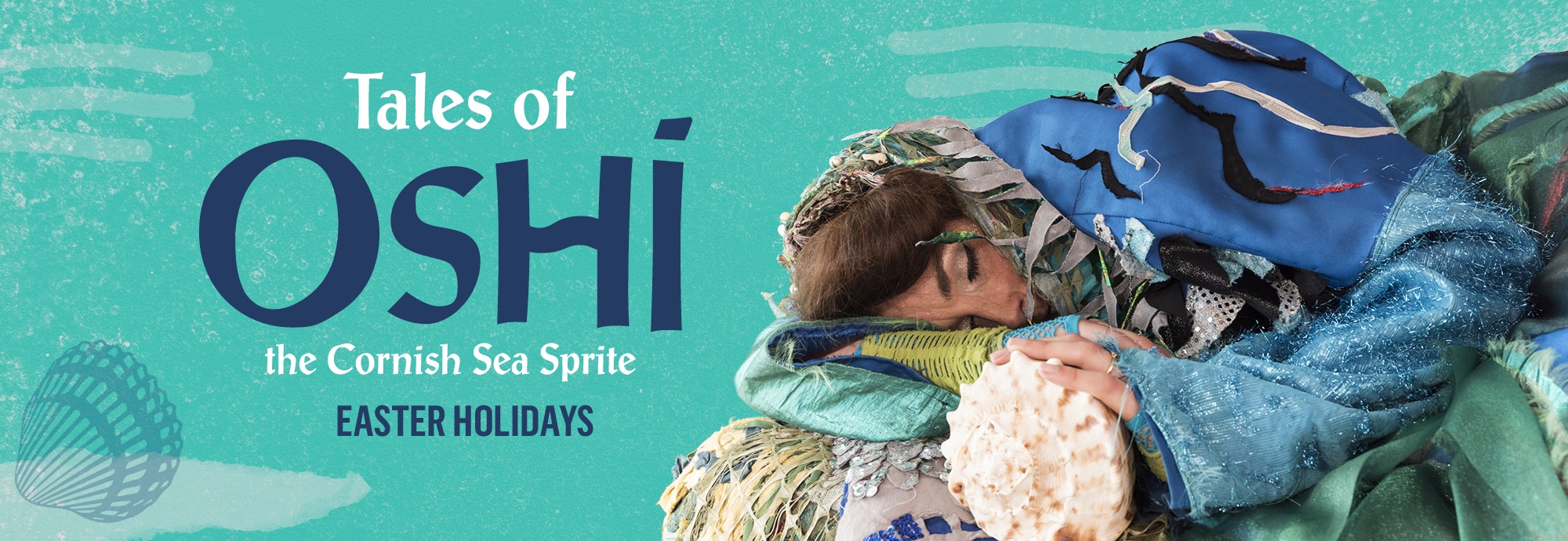 Text on the left against a blue-green background reads 'Tales of Oshi the Cornish Sea Sprite' and 'Easter Holidays'. On the right, a woman in a blue costume lies on her side with her eyes closed, one hand resting on a conch shell.