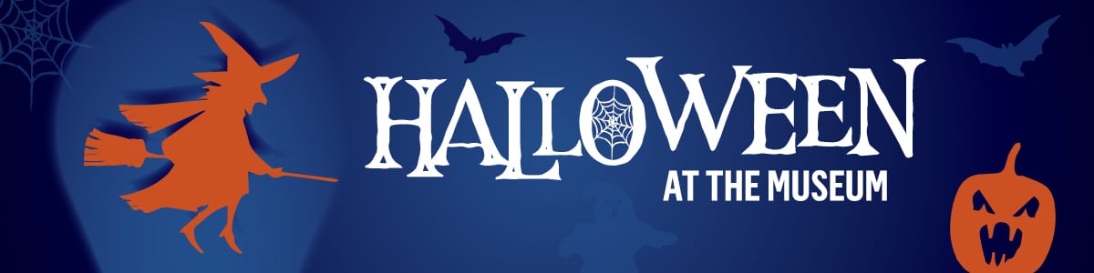 White text reads 'Halloween at the Museum'. The background is a dark blue colour, with orange silhouettes of a witch riding a broom, and a pumpkin with a face carved into it.