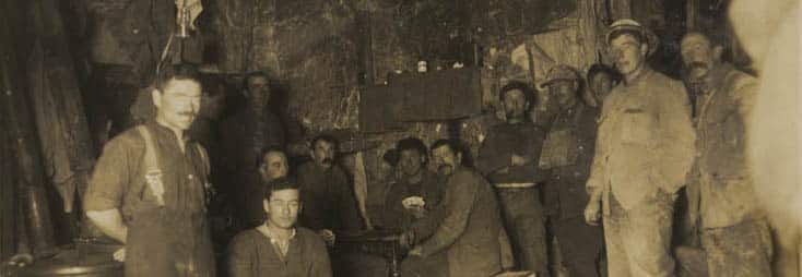 Black and white photograph of the living room of the New Zealand Tunnelling Company below ground at La Fosse Farm Arras.