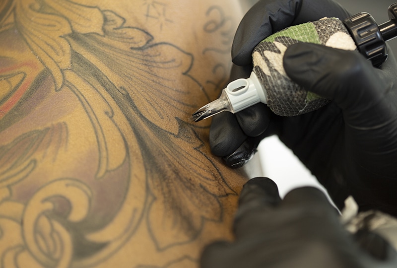 A close-up of a tattoo in progress.