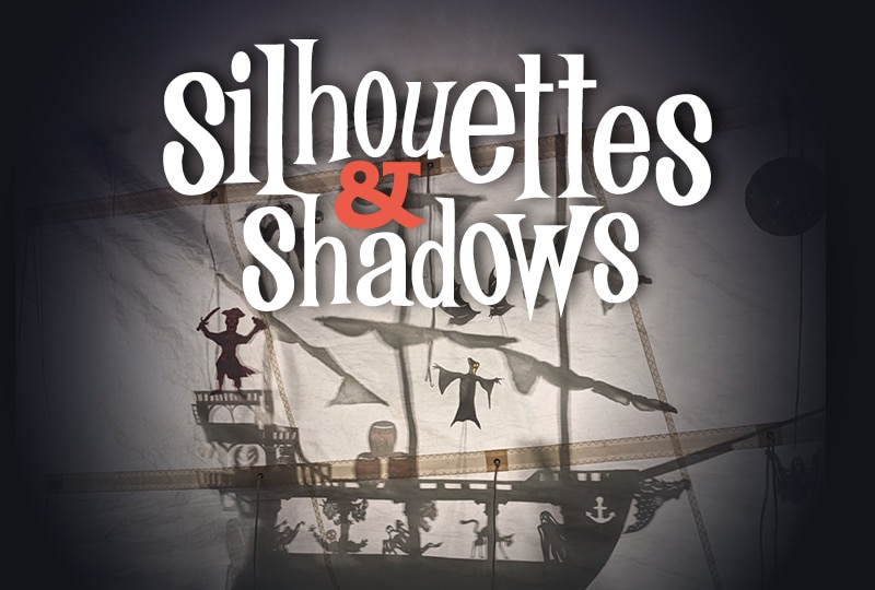 'Silhouettes & Shadows' is written across the top of the image. Below it, a pirate ship and a couple of sailors are silhouetted against a canvas sail.
