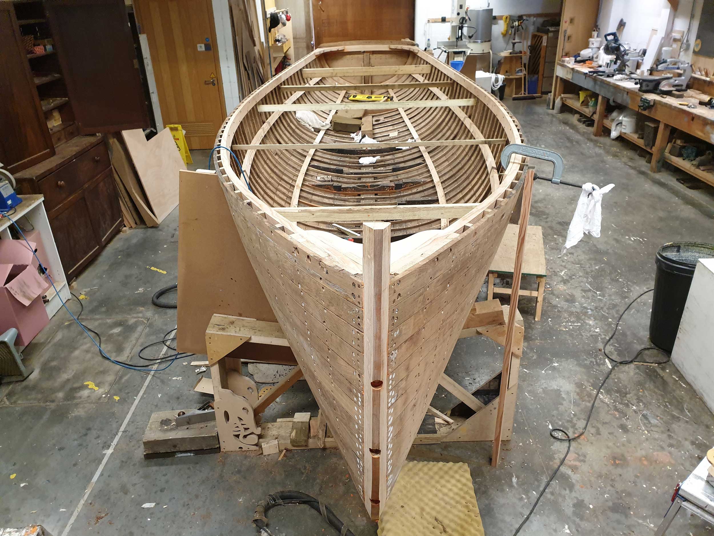 Photo of the steam launch 'Emma' undergoing restoration work in the Museum's workshop.