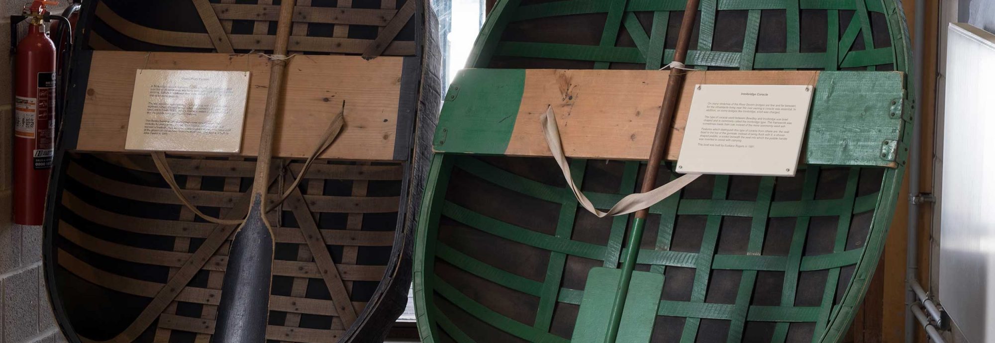 Photo of the Museum's two coracles, positioned side-by-side.