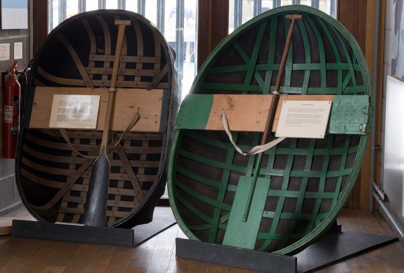 Photo of the Museum's two coracles, positioned side-by-side.