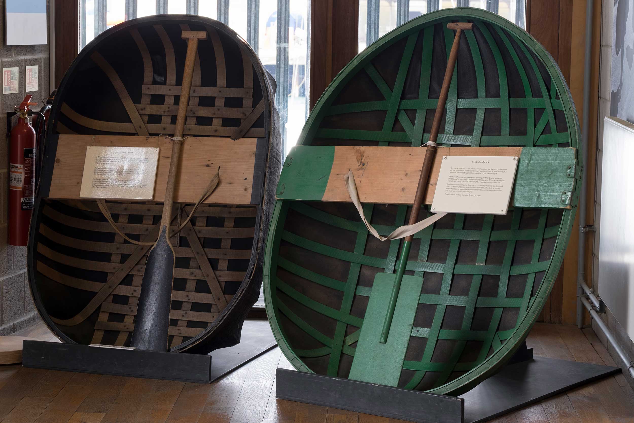 Photo of the Museum's two coracles, positioned side-by-side.