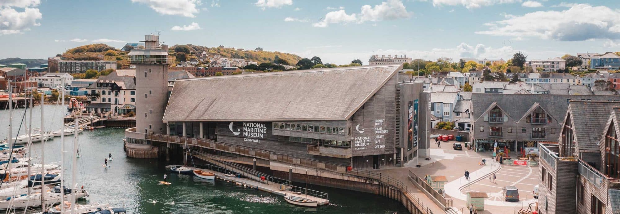 Exterior aerial photo of National Maritime Museum Cornwall, in Falmouth. Pictured on a sunny day.