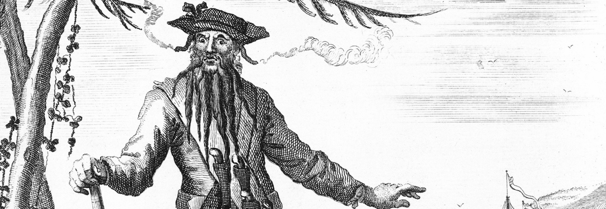 A black and white illustration of Blackbeard on a beach.
