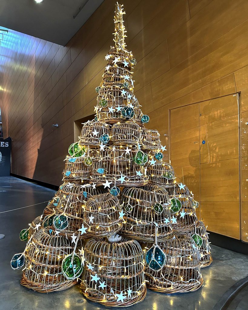 A sparkling Christmas tree at National Maritime Museum Cornwall. The tree is made with lobster pots.