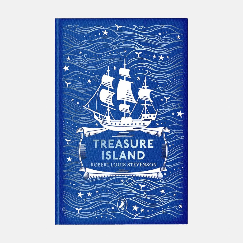 A scan of the front cover of Treasure Island, Puffin clothbound hardback edition. It's a blue front cover with white detailing of a sailing ship, waves and stars.