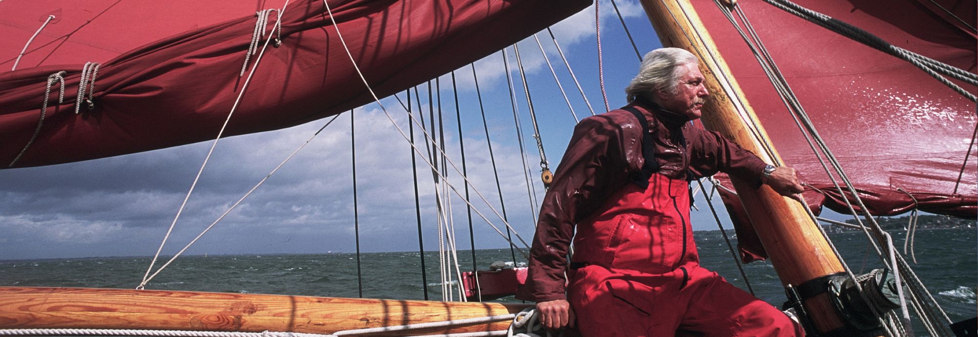 Tom Cunliffe aboard a sailing boat.