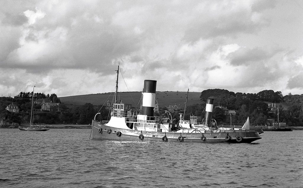 Fairnilee, later named St Agnes, in Falmouth Harbour with tug Lynch behind her. Taken during August 1956.
