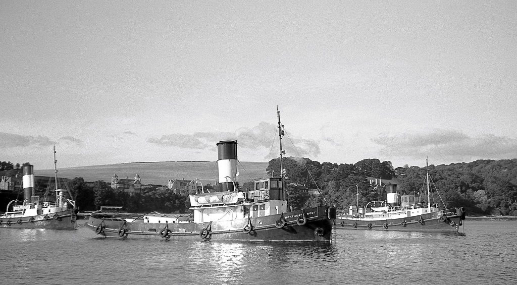 A photo of steam tug Northgate Scot, later named St Denys, moored in Falmouth Harbour, taken in August 1957.
