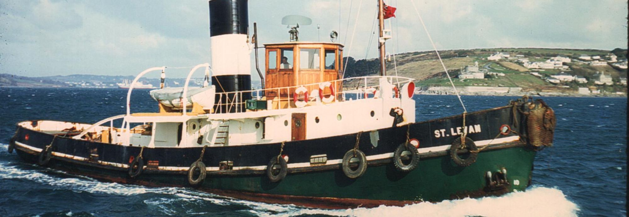 Falmouth tug St Levan with St Mawes Castle in the background.