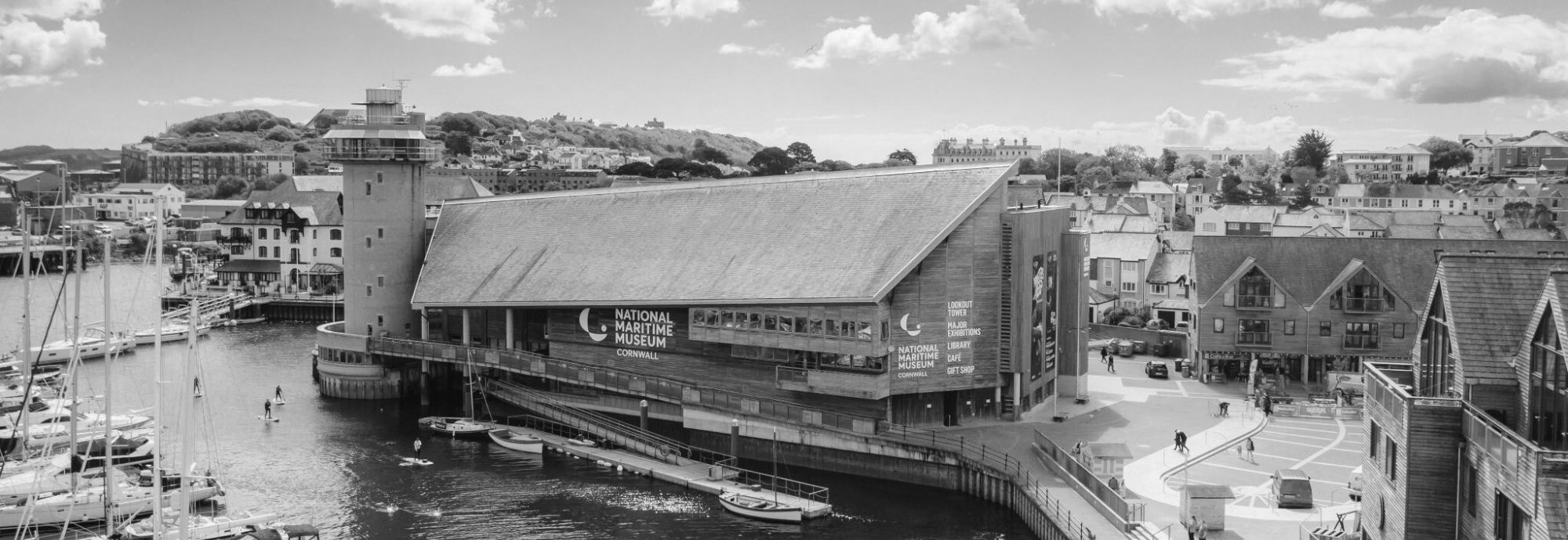 A black and white external shot of National Maritime Museum Cornwall.