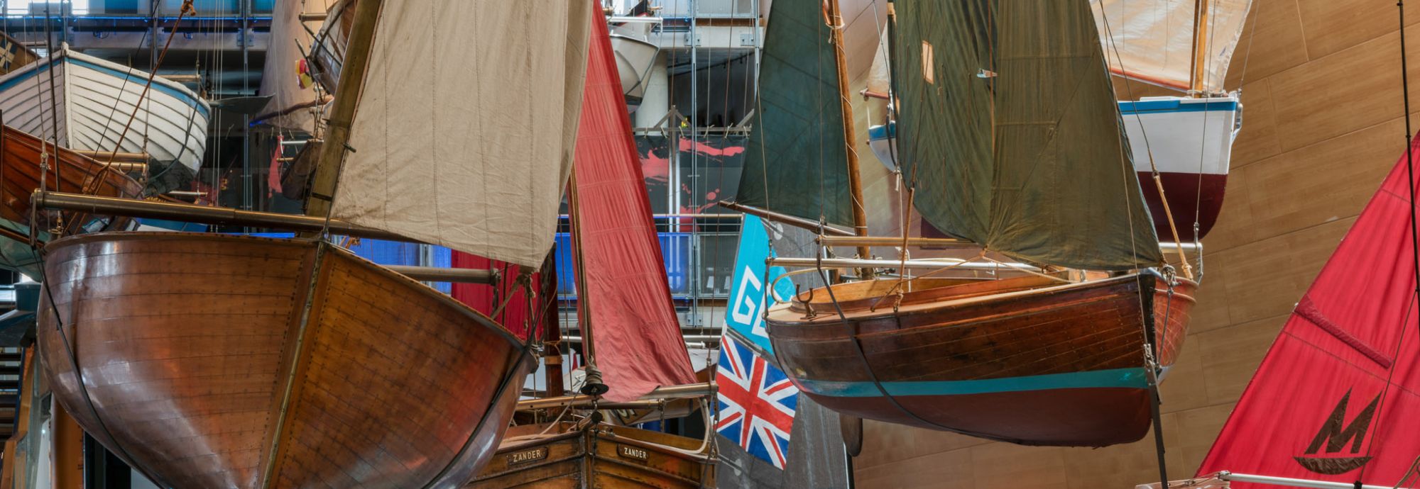 A photo of the hanging boats at National Maritime Museum Cornwall.