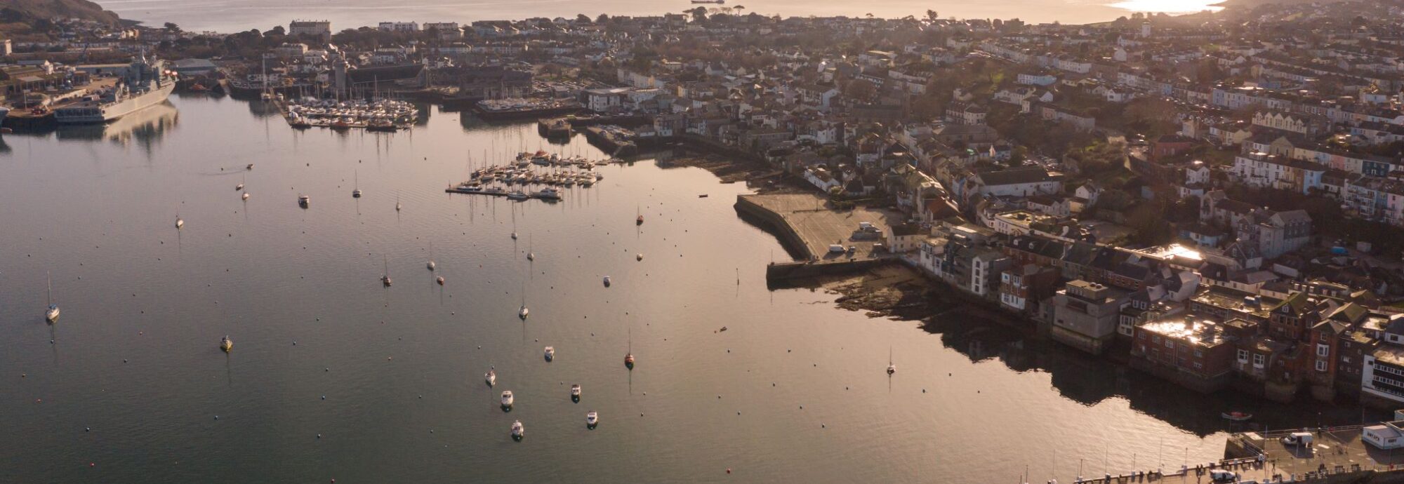 An aerial view of Falmouth at sunset.