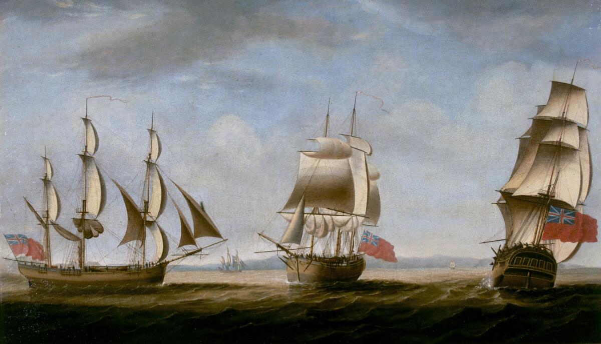 A painting of three ships in full sail at sea.