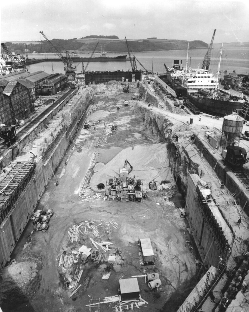 A black and white photograph looking down into the Dock from the Castle Drive viewing area.