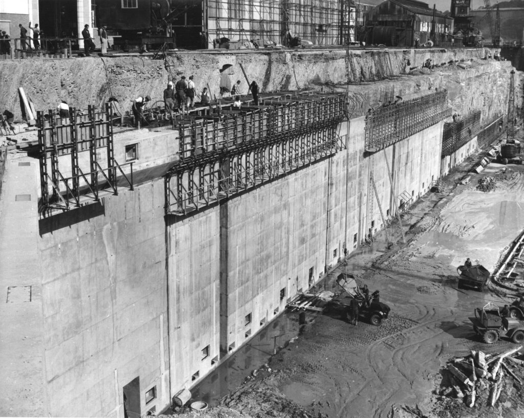 A black and white photograph showing the new bay added to the Platers Shop.