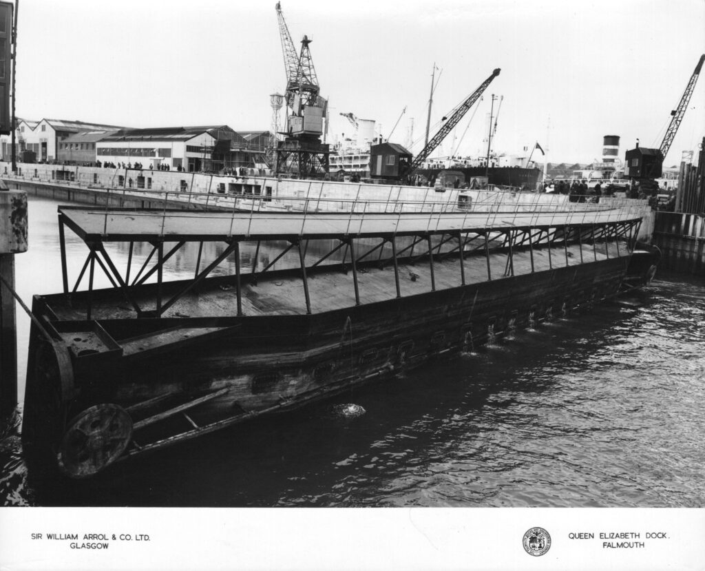 A black and white photograph showing the gate in position at the dock.