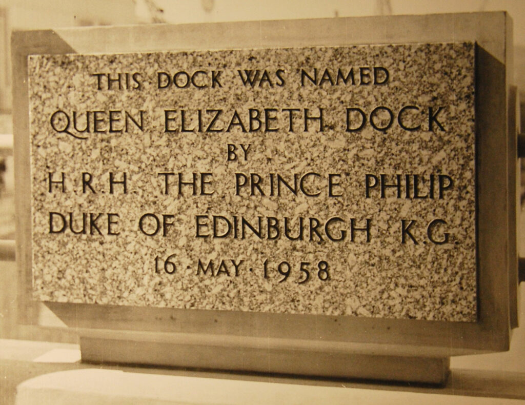 A photograph of a commemorative plaque that reads 'This dock was named Queen Elizabeth Dock by H.R.H The Prince Philip, Duke of Edinburgh K.G, 16 May 1958