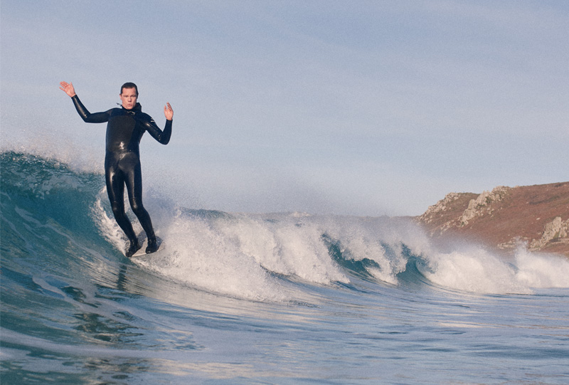 Surfer Sam Bleakley catching a wave