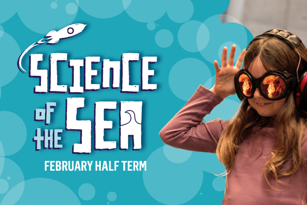 On the left hand side of a poster white text on a turquoise background of bubble shapes reads 'Science of the Sea - February Half Term' with a rocket illustration shooting of the words. On the right hand side a girl wearing ear defenders and eye goggles holds her hands up in the air smiling, and the reflection in her goggles shows a burst of flames from a science experiment.