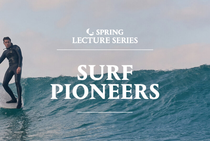 A photograph shows a man wearing a black wetsuit surfing a wave, in the middle of the image the text reads 'spring lecture series - Surf Pioneers' with a logo.