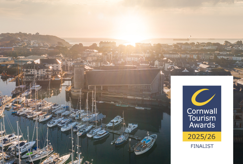 An aerial photograph of National Maritime Museum Cornwall with a graphic logo that reads Cornwall Tourism Awards 2025/26 Finalist.