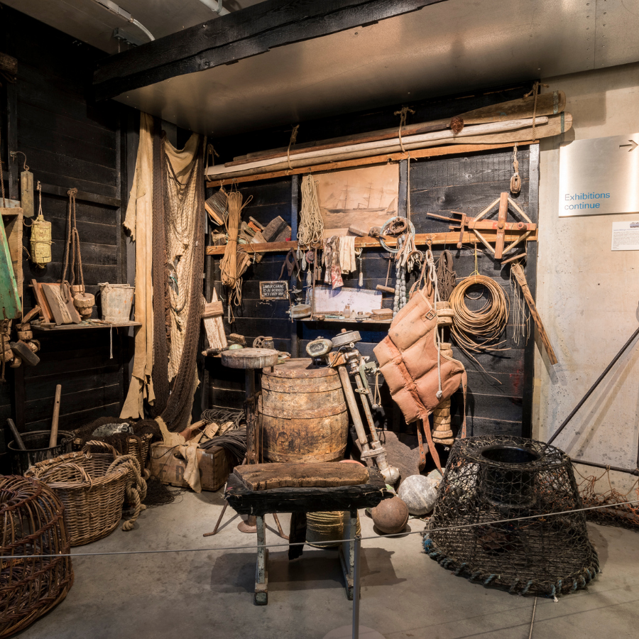 The Cornish Quayside Gallery at National Maritime Museum Cornwall, with authentic display of fishing equipment and objects.