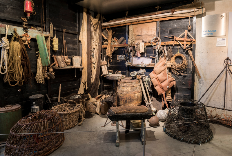 The Cornish Quayside Gallery at National Maritime Museum Cornwall, with authentic display of fishing equipment and objects.