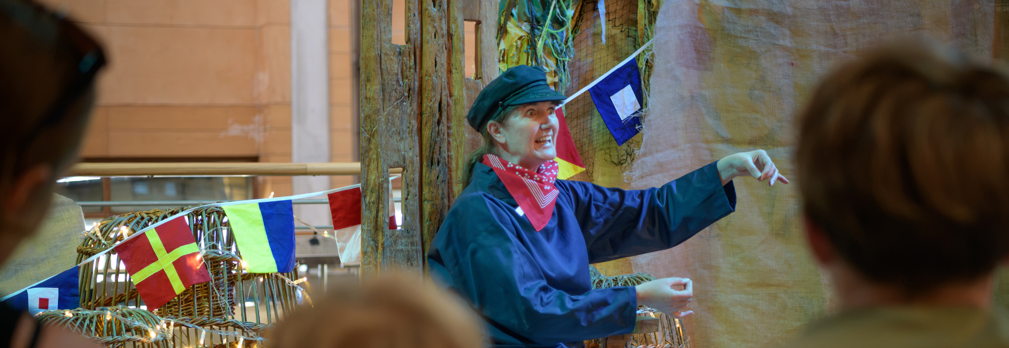 Cornish Storyteller Jenny Beare sharing Sailor's Tales with audiences at National Maritime Museum Cornwall.