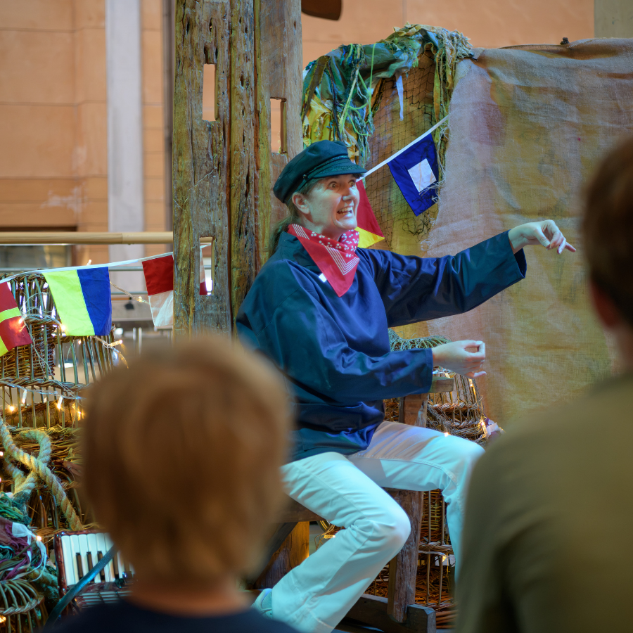 Cornish Storyteller Jenny Beare sharing Sailor's Tales with audiences at National Maritime Museum Cornwall.